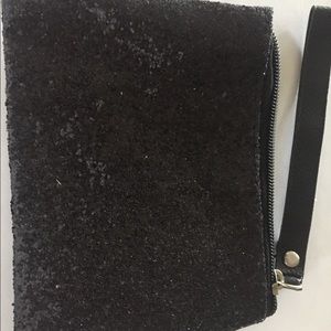 Black sequined wristlet.